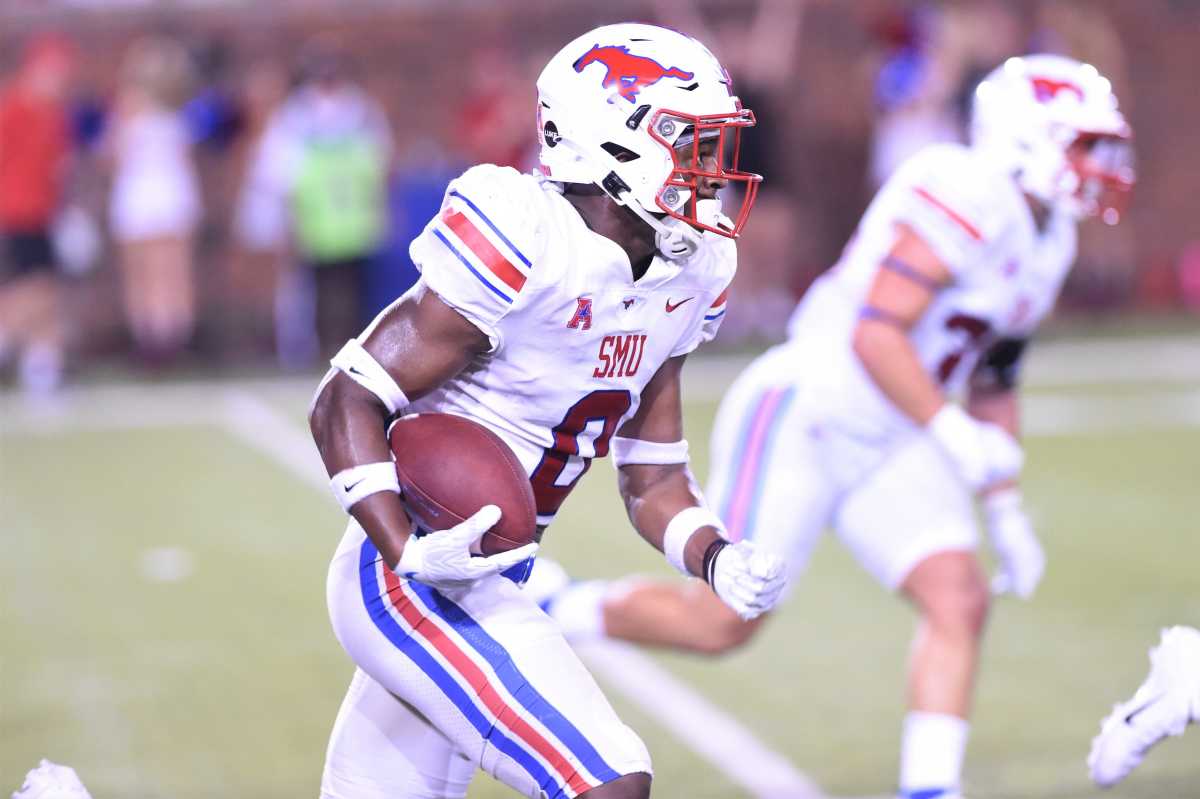 SMU's Bryan Massey (0) returns an interception on the final play of Saturday's game against ACU at Gerald J. Ford Stadium in Dallas on Sept. 4, 2021. The Mustangs won 56-9. Hof 8420 2